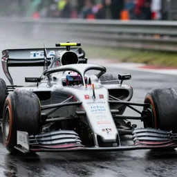 formula 1 cars racing in the wet, blurred and rain drops on lens