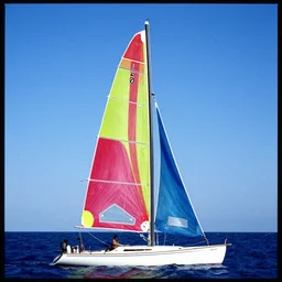 colorful sailboat, photorealism, oversaturated blues, velvia film
