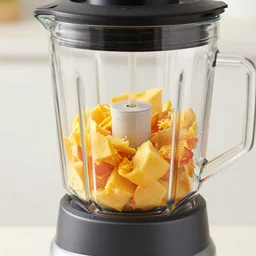 fruits inside a blender getting shredded, high speed blender, slow motion, 8 k, macro shot, canon 4 0 mm, studio light