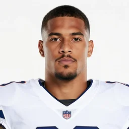 headshot of a football player on a white backdrop, cornerback cole briarson, aged 2 7 years old, a stock photo by mac conner, associated press photo