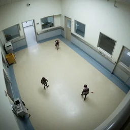 overhead view, surveillance, emptypet hospital with some zombies moving around on the floor,
