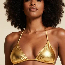 close up of head of a black woman with afro in a gold bikini, official versace editorial, highly detailed