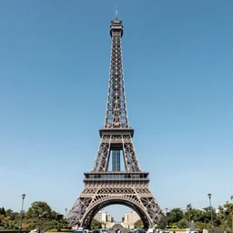 a large metal tower in the middle of Paris 4K photo