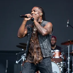 photo of an uruk - hai performing at woodstock