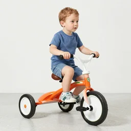 Gerry Adams riding a orange, white, and green tricycle