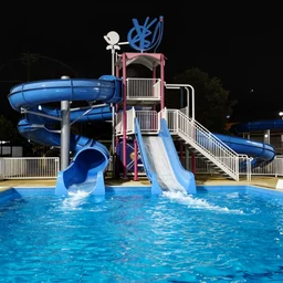 2 0 0 0 s waterpark blue water slide empty pool liminal nighttime dark nikon coolpix 5 1 0 0