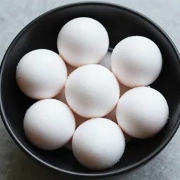 a black bowl of white eggs, wet plate photography, award winning, high detail, 8 k,