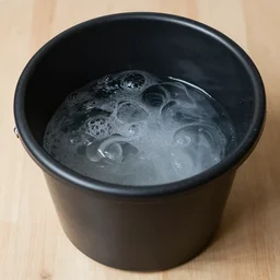 huge black bucket for crying lots of tears