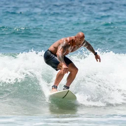 Dwayne Johnson surfing in a bathtub