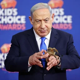 benjamin netanyahu getting slimed at the kid's choice awards, sharp focus, highly detailed