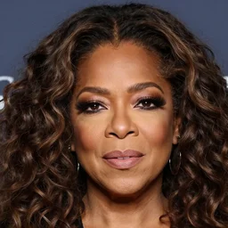 Oprah takes it to the face