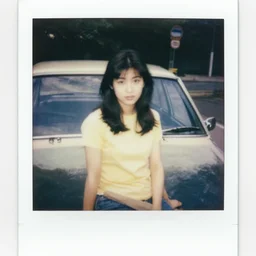 Polaroid of a young japanese woman sitting on a car, 1972