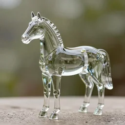 a beautiful horse statue made of glass, realistic, natural lighting,