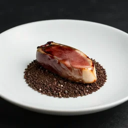 foie gras served with dirt and gravel on a dinner plate, michelin star restaurant, 4K photo