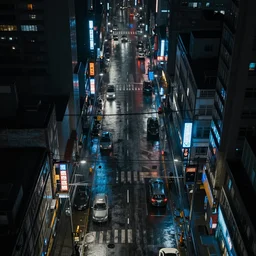 a city street at night, raining, photograph, cyberpunk, sharp focus, intricate detail, Desolate, drone shot, high resolution, 8k, neon streetlights, wires hanging down everywhere