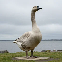 big goose statue in standing pose by dieter rams at cloudy shore