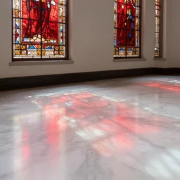 the sun shines through red stained glass windows and casts a beautiful red reflection on the white marble floor below, i see the ornate pattern of the windows outlined by the red light on the white marble floor