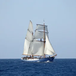 sailing ship emerging from ocean
