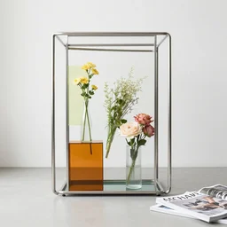 flower retail, minimal, stainless steel and color glass, frame magazine, archidaily